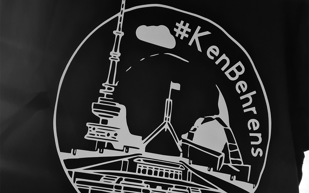 Detail from a ‘Ken Behrens’ T-shirt (DXT Designs/Facebook)